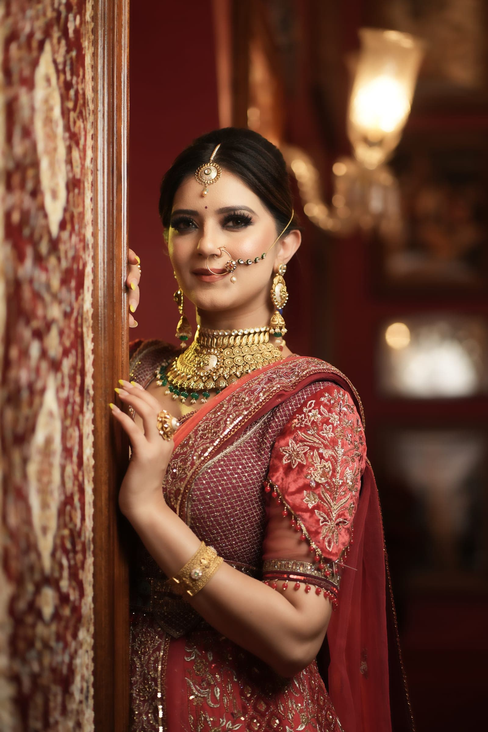 A bride taking the last look in the mirror on her wedding morning