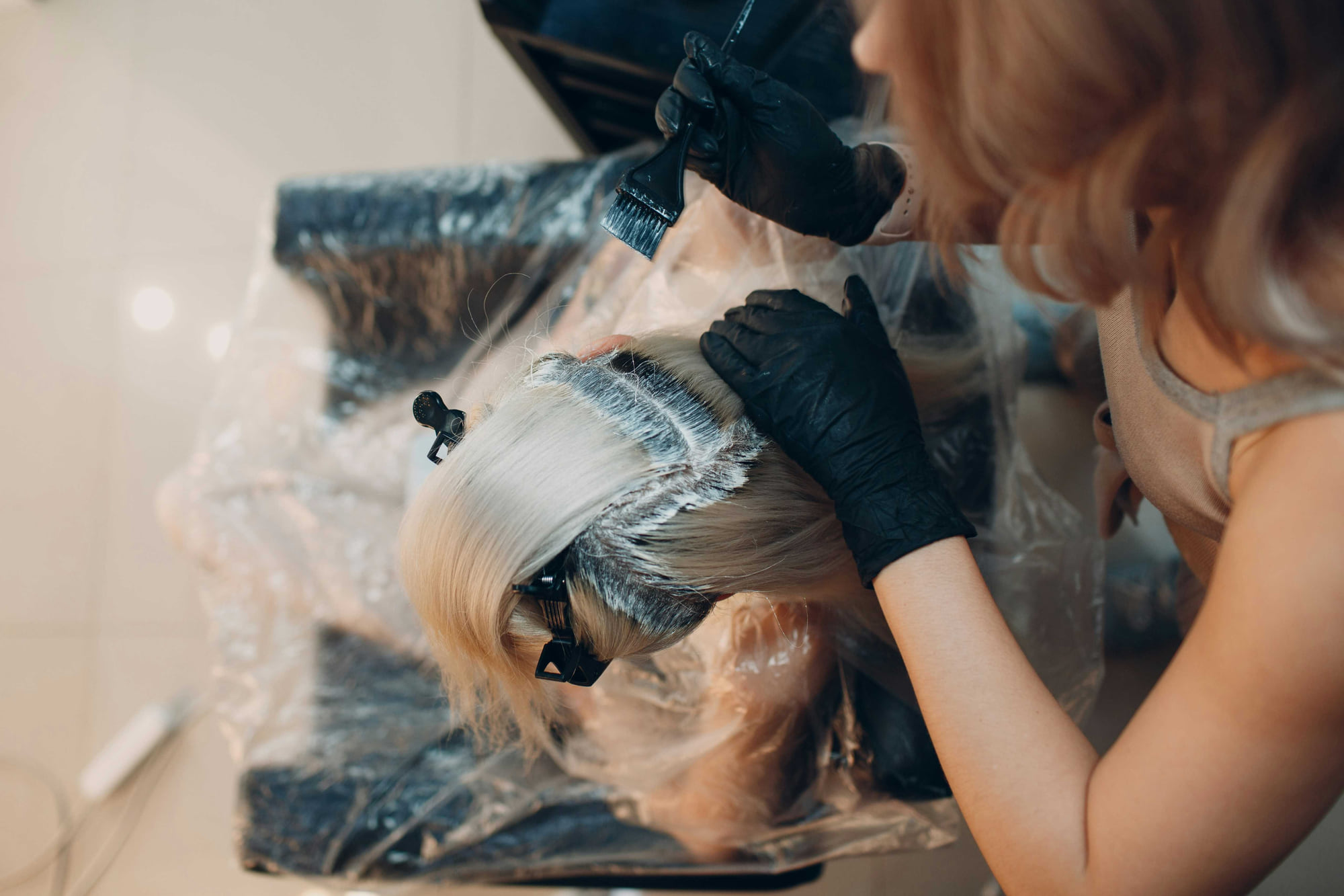 Hair colour being brushed on and foiled at the Anthéa Makeover hair salon in Jalandhar